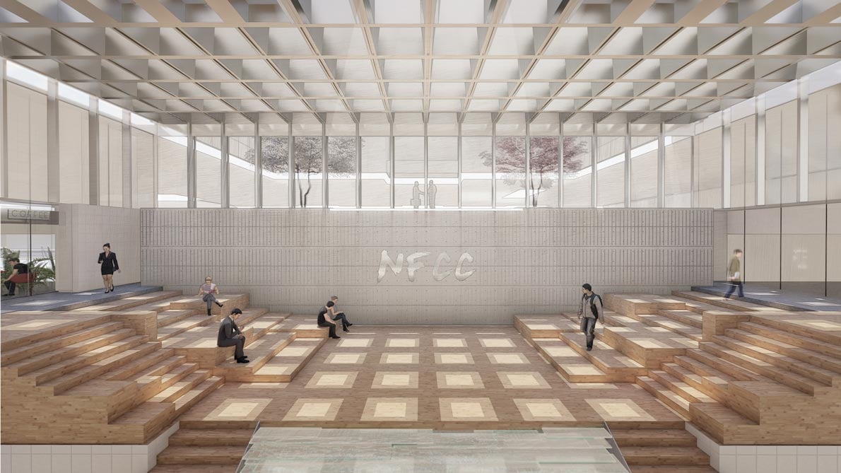 Lobby of design centre with white walls and wooden floor